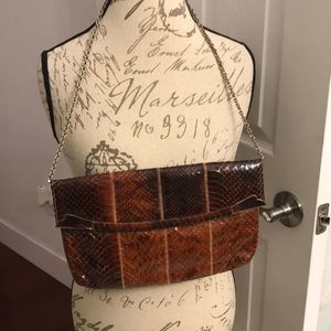 Cute rust colored bag  with chain strap